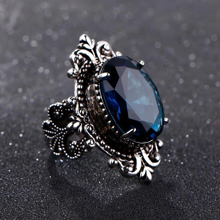 Vintage ring med mørkeblå sten